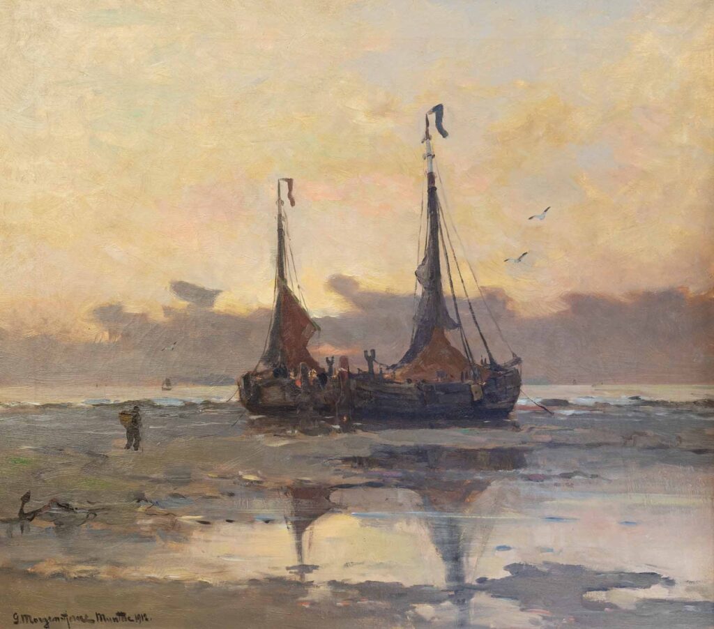 Twee bomschuiten op het strand